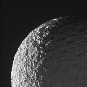 A high-relief image of Mimas by Cassini on January 30, 2017.  The  shapes and the texture of its many overlapping craters can clearly be seen.