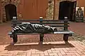 Replica of the "Homeless Jesus" sculpture of Timothy Schmalz at front of the convent