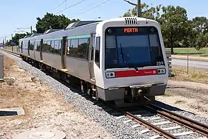 Transperth 3'6" gauge 2-car emu No.209 between Bassendean and Ashfield on a Midland - Perth service