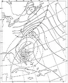 A weather chart on May 18 shows a developing tropical cyclone near the Bahamas.