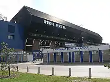 The West Stand with several turnstiles in front of it