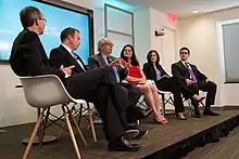 Brown in 2016 (second on the right), taking part in a New America policy roundtable discussion on the implications of a potential election of Donald Trump