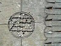 Decaying wood inlay on a chest in a Greek monastery.