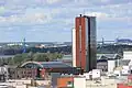 The Itämerentorni complex with the Itämerentorni high-rise building seen from the rooftop terrace of the Verkkokauppa.com electronics store.