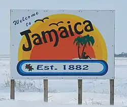 Welcome sign of Jamaica, Iowa, Ironically covered in snow.