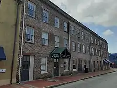 Rear view of the James McIntire Building, 222–236 West St. Julian Street, from West Bryan Street