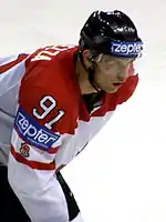 Jason Spezza with a Zepter sponsor on his uniform