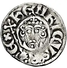 A photograph of the "heads" side of a silver King John penny