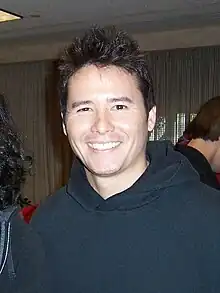 A smiling Johnny Yong Bosch