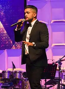 Jovany Javier performing at the COMPASS Awards Presentation in Singapore, September 2016