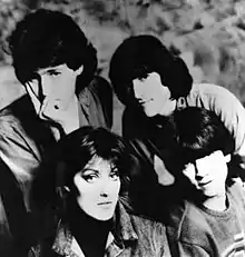 Clockwise from top left: Alex Cooper, Vince de la Cruz, Kimberley Rew, and Katrina Leskanich; 1985