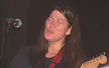 Kim Deal performing in 2008