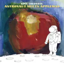 A drawing of an astronaut in front of a painting of an apple