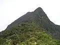 The peak of Mount Korbu, the tallest mountain of the range.