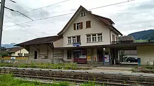 Three-story building with arched roof