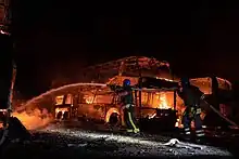 Burning buses in Kyiv after the attack, 16 May 2023