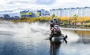 Snowmobile racing on water