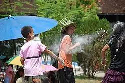 Flour throwing in Laos