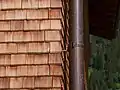 Details of a wooden shingle façade in Lech, Austria