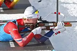 Prone shooting utilizing the hand stop and shooting sling. (Notice the carrying harness not being used as a shooting sling).