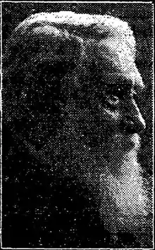 black and white picture of the head of a bearded man