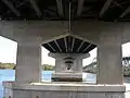 View of the underside of the bridge, showing the dual two-lane spans