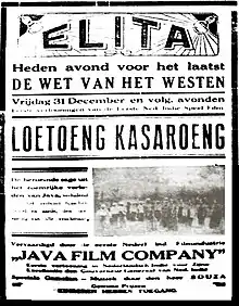 A poster with Malay-language text, reading Loetoeng Kasaroeng in large letters; an image is also visible.