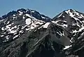 Hal Foss Peak to left with Mount Mystery looming directly behind it.Mount Fricaba to right. View from Marmot Pass.