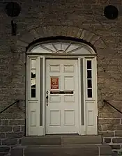 Fanlight over door with sidelights