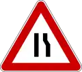 Road narrows on right side