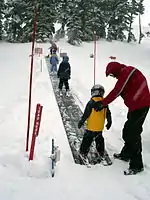 Children from 4 to 8 enrolled in Timberline ski school's Bruno's Kids Club often start on this magic carpet