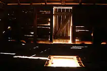 View from inside the winnowing barn at Mansfield Plantation. Note the hole in the floor where the unpurified grain was dropped