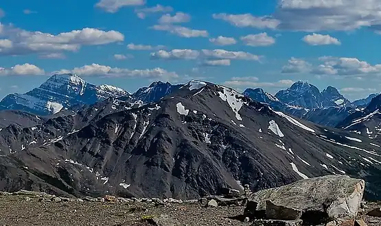 Marmot's north aspect centered, seen from The Whistlers.Mt. Edith Cavell to left, Throne Mountain to right.