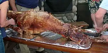 Méchoui, a whole sheep, spit-roasted