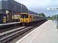 A Merseyrail Class 507 at the station