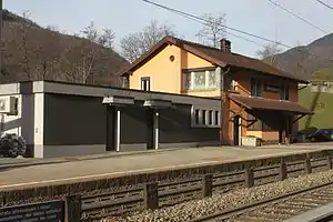 Two-story building with gabled roof