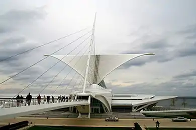 The movable Burke brise soleil on the Quadracci Pavilion of the Milwaukee Art Museum closes at sunset.