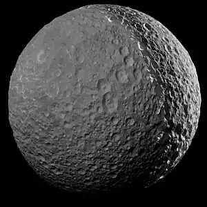 One of Cassini's final close approach to Mimas, imaged from a distance of 41,230 kilometers (25,620 miles) on January 30, 2017. Sunlight reflecting from Saturn is causing the moon to shine on the left.