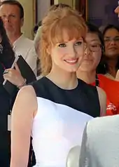 A shot of Jessica Chastain smiling away from the camera