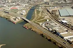 View of two rivers meeting in the middle of an industrial area