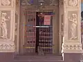 A monkey at the entrance of the Jakhu Temple