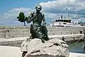 Monument to the fisherman on the quay