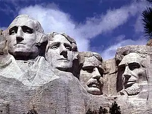 Gutzon Borglum and his son, Lincoln Borglum, Mount Rushmore, 1927–1941. L–R, George Washington, Thomas Jefferson, Theodore Roosevelt, and Abraham Lincoln.