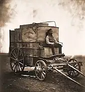 Image 8Roger Fenton's Photographic Van, 1855, formerly a wine merchant's wagon; his assistant is pictured at the front. (from Photojournalism)