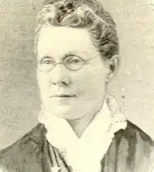 Older white woman wearing glasses