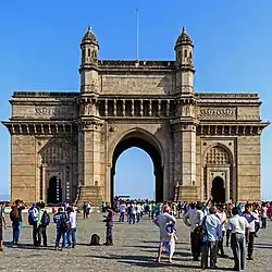 The Gateway of India is an arch-monument built in 1913–1924 in Mumbai, India, to commemorate the landing of Emperor George V, the first British monarch to the country, in December 1911.