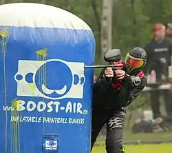 A person playing paintball