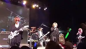 Japanese visual kei rock band Nightmare performing live in 2014