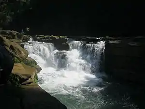 Image 3NgafaKhong (native Marma term) or Nafa-khum waterfall is situated on the Remaikree River, a tributory of Sangu river. The wild hilly Remaikree river suddenly falls down here about 25–30 feet. The falls are located in a remote area two hours' walking distance from Remakree bazar, Thanchi Upazila, Bandarban District.Photo Credit: Abu Md. Jakaria