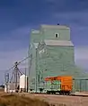 Former Alberta Wheat Pool elevators and box car.